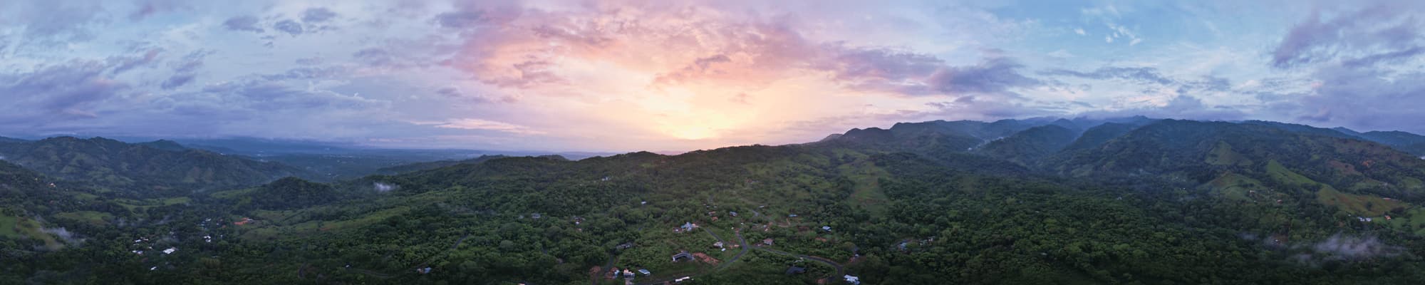 A rainy season sunset over the Alegría Village Community
